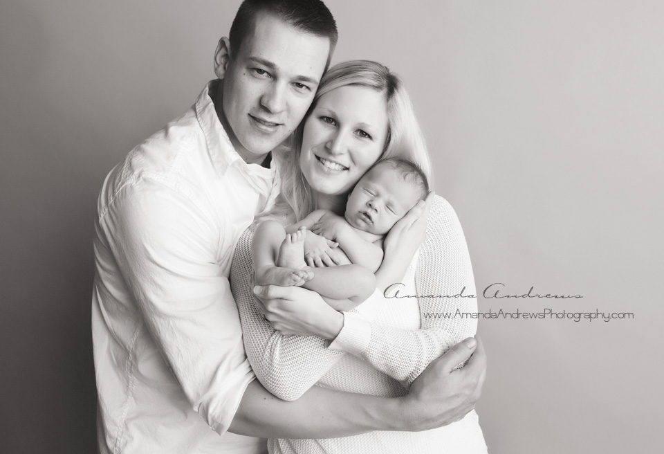 mom, dad and newborn baby